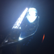 Close-up of the headlights at night
